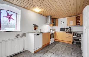 a kitchen with a starfish on the wall at Gorgeous Apartment In Esbjerg V in Esbjerg