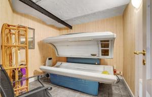 a small room with a bed in a room at Gorgeous Apartment In Esbjerg V in Esbjerg