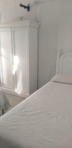 Giường trong phòng chung tại Residencial Miradoiro Guest House