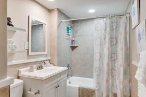 a bathroom with a sink and a toilet and a shower at Adorable 2-Bedroom Home in Hopewell near Hospital in Hopewell
