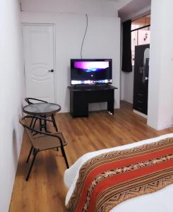 TV o dispositivi per l'intrattenimento presso Hostal Cusco de mis Sueños