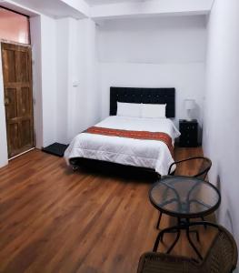 Letto o letti in una camera di Hostal Cusco de mis Sueños
