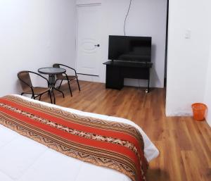 TV o dispositivi per l'intrattenimento presso Hostal Cusco de mis Sueños