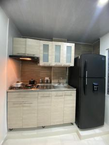 Kuchyň nebo kuchyňský kout v ubytování Hostal La Princesa