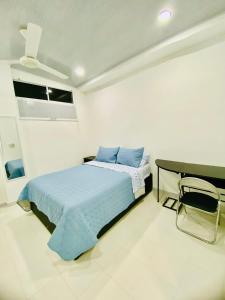 Postel nebo postele na pokoji v ubytování Hostal La Princesa