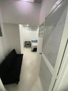 Postel nebo postele na pokoji v ubytování Hostal La Princesa