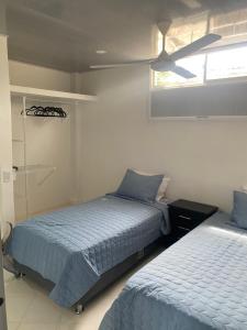 Postel nebo postele na pokoji v ubytování Hostal La Princesa