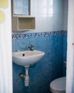 Koupelna v ubytování Pondok IJo Guesthouse + 14 fotografií
