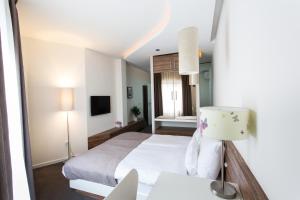 Ліжко або ліжка в номері Hotel Sole