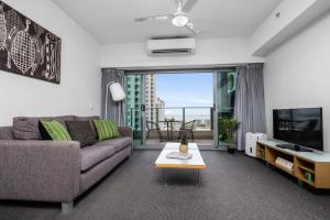 En sittgrupp på ZEN CITY & SEA Executive 1-BR Suite in Darwin CBD