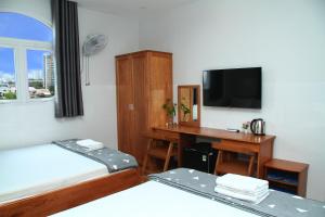 Postel nebo postele na pokoji v ubytování HOTEL NGUYEN ANH