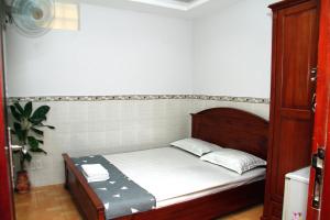 Postel nebo postele na pokoji v ubytování HOTEL NGUYEN ANH