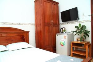 Postel nebo postele na pokoji v ubytování HOTEL NGUYEN ANH