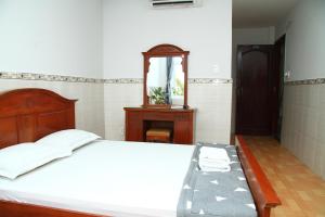 Postel nebo postele na pokoji v ubytování HOTEL NGUYEN ANH