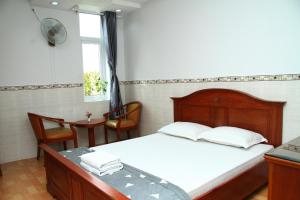 Postel nebo postele na pokoji v ubytování HOTEL NGUYEN ANH