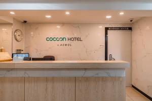 Certifikát, hodnocení, plakát nebo jiný dokument vystavený v ubytování Cocoon Hotel