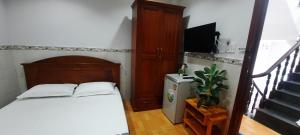 Postel nebo postele na pokoji v ubytování HOTEL NGUYEN ANH