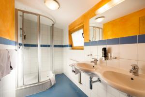 Ein Badezimmer in der Unterkunft Hotel Bergkranz