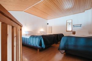 Postel nebo postele na pokoji v ubytování Lapland Hotels Sirkantähti