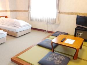 Postel nebo postele na pokoji v ubytování New Yokote + 37 fotografií