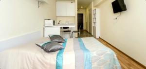 Kuchyň nebo kuchyňský kout v ubytování Apartments SmartHause