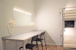 Ένα ή περισσότερα κρεβάτια σε δωμάτιο στο GLOBE Hostel Prague ADULTS ONLY