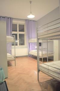 Ένα ή περισσότερα κρεβάτια σε δωμάτιο στο GLOBE Hostel Prague ADULTS ONLY