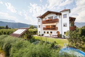 a villa with a view of a house at Bbmarlene in Bolzano
