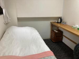 Postel nebo postele na pokoji v ubytování GreenHotel
