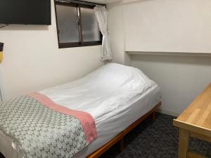 Postel nebo postele na pokoji v ubytování GreenHotel