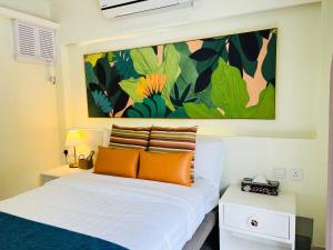 Ένα ή περισσότερα κρεβάτια σε δωμάτιο στο Bellagio Pets Friendly Resort