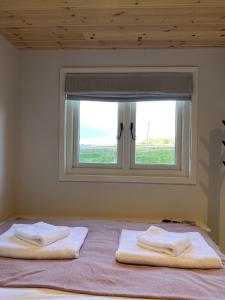 Postel nebo postele na pokoji v ubytování Meadow View - Bottom Cabin