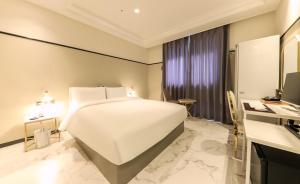 En eller flere senger på et rom på Brown Dot Hotel Yangsan Seochang
