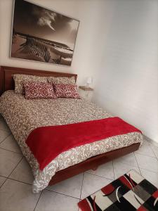 Un pat sau paturi într-o cameră la Lady's house