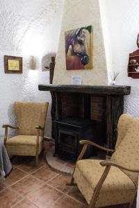 Część wypoczynkowa w obiekcie Casa Cueva Picoesquina