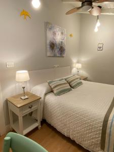 A bed or beds in a room at Agroturismo Ibarra