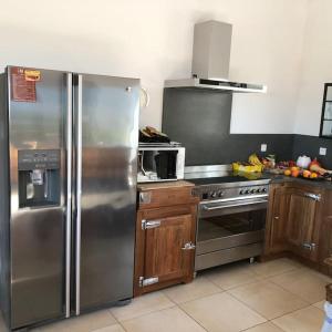 Kuchyňa alebo kuchynka v ubytovaní Villa de charme avec piscine entre Ajaccio et Porticcio