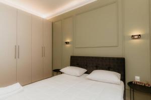 Posteľ alebo postele v izbe v ubytovaní Satus Finem Egnatia's Luxury Suite