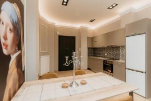 Kuchyňa alebo kuchynka v ubytovaní Satus Finem Egnatia's Luxury Apartment