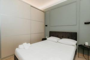 Posteľ alebo postele v izbe v ubytovaní Satus Finem Egnatia's Luxury Apartment