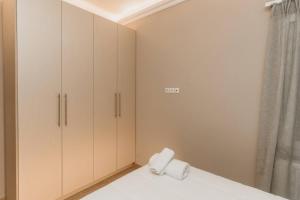 Posteľ alebo postele v izbe v ubytovaní Satus Finem Egnatia's Luxury Apartment
