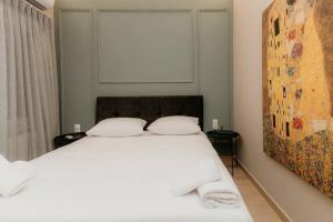 Posteľ alebo postele v izbe v ubytovaní Satus Finem Egnatia's Luxury Apartment