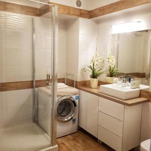 Kúpeľňa v ubytovaní Apartamenty City Center - Zdrojowe