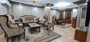 A seating area at Comfy 2-Bedrooms Apartment in Cairo 44-2