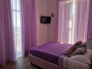 Postel nebo postele na pokoji v ubytování Antares Rooms