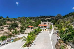 an aerial view of a resort with palm trees at Villa Katia Faragi by Villa Plus in Giannoudi