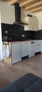 Kuchyň nebo kuchyňský kout v ubytování Apartamento El Olivo