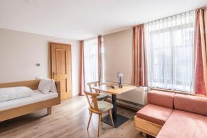 Postel nebo postele na pokoji v ubytování Familienhotel Adler