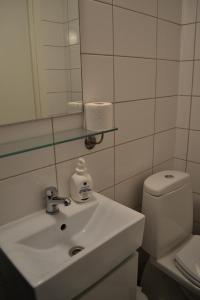 Koupelna v ubytování Hotell Skinnargården