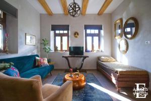 TV a/nebo společenská místnost v ubytování Patrimonium Wellness Apartments